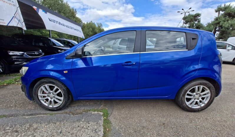 Chevrolet Aveo Klimatyzacja, Podgrz. fotele, Ele szyby 4x, Czujniki park., 2 kpl. kół T30) (2011-) full
